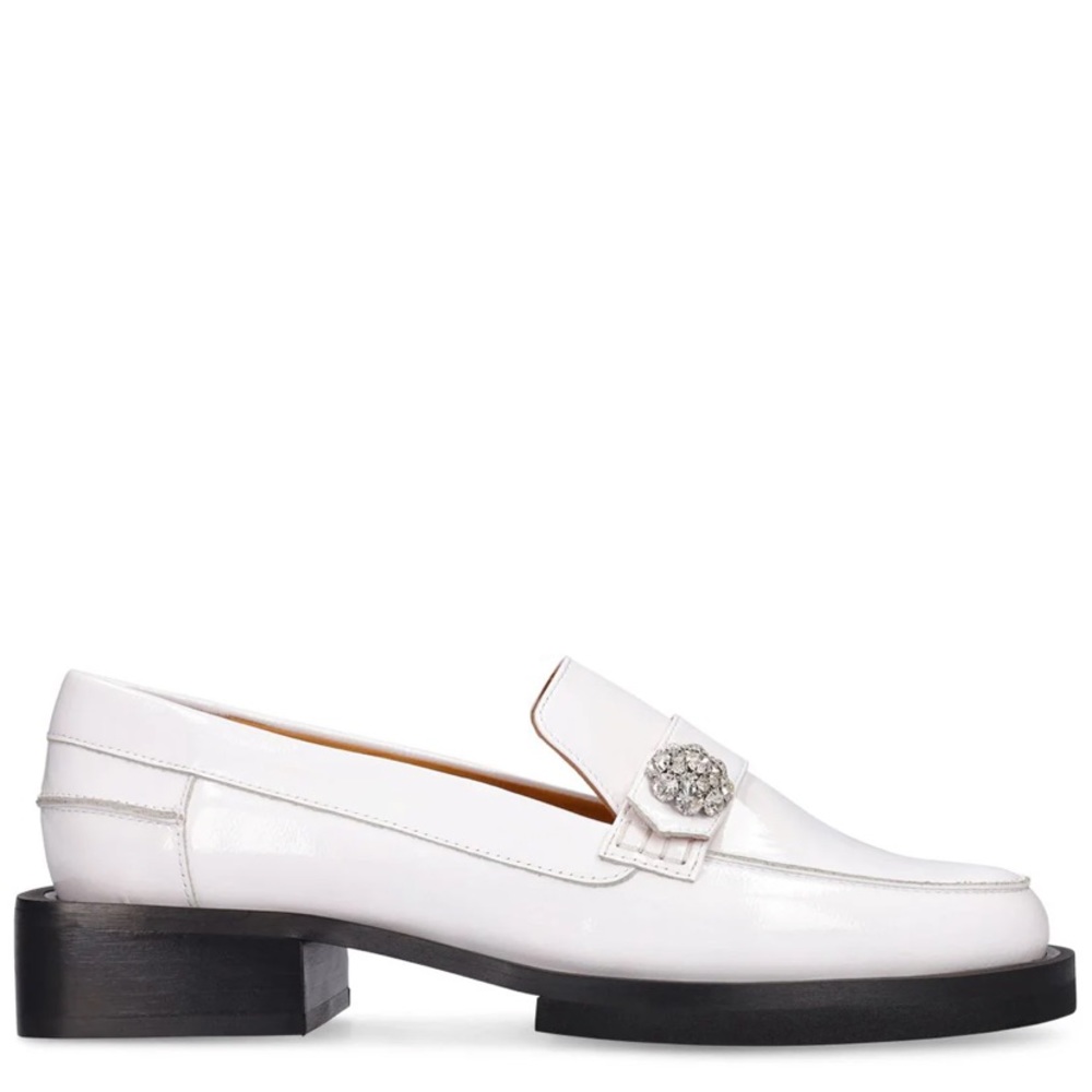 white ganni Moccasins round toe, square heel and an embellished button.